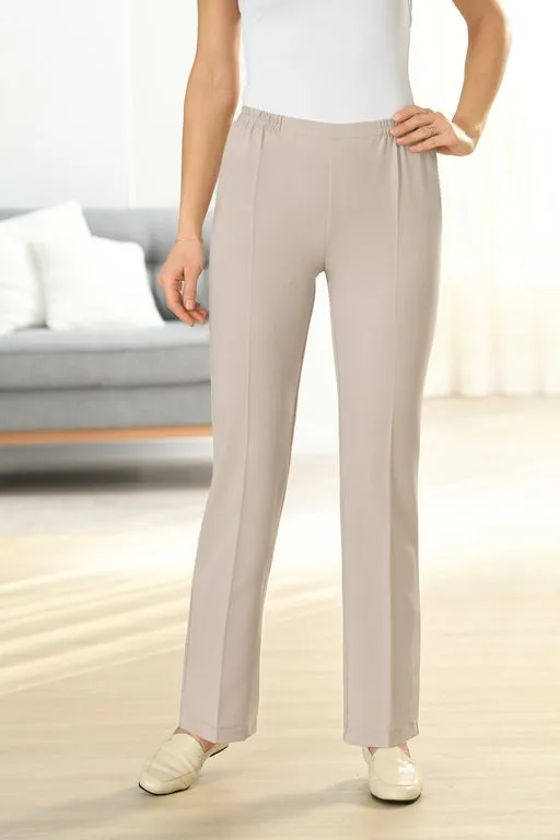 Le pantalon beige à taille eslastiquée