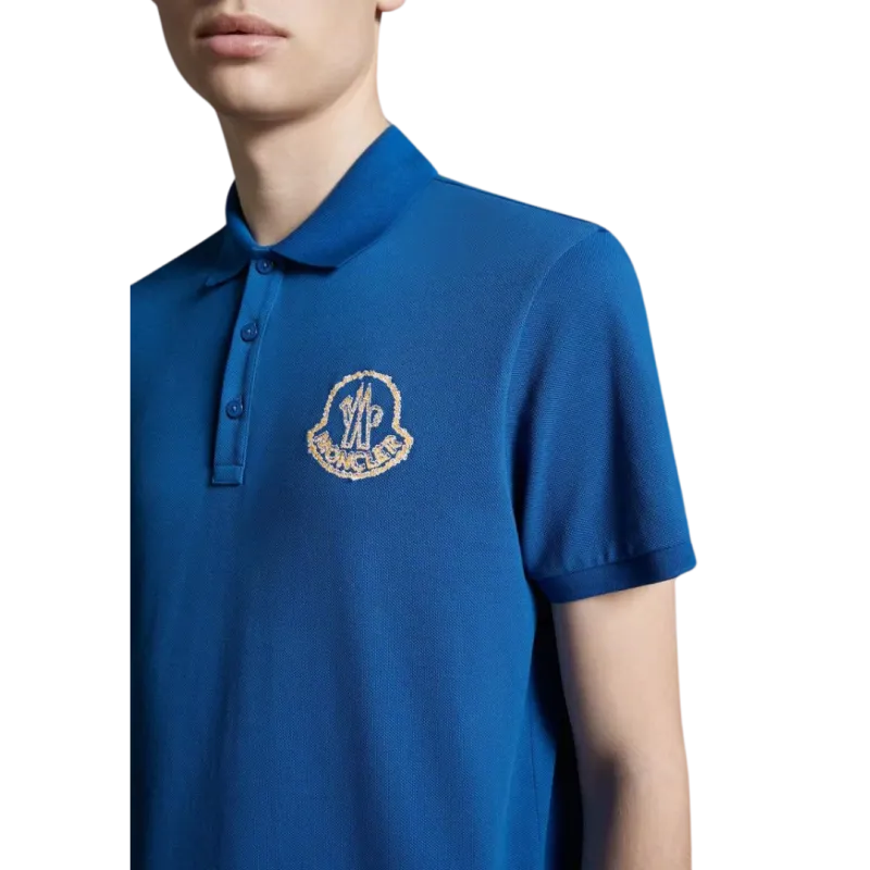 Polo coton piqué bleu broderie logo orange