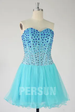 Robe de bal courte en tulle turquoise corsage scintillant