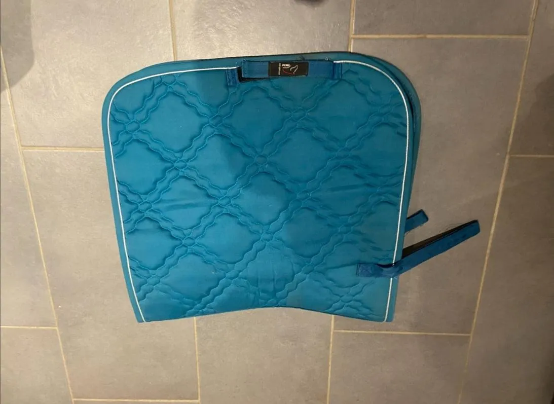 Tapis de selle turquoise hkm