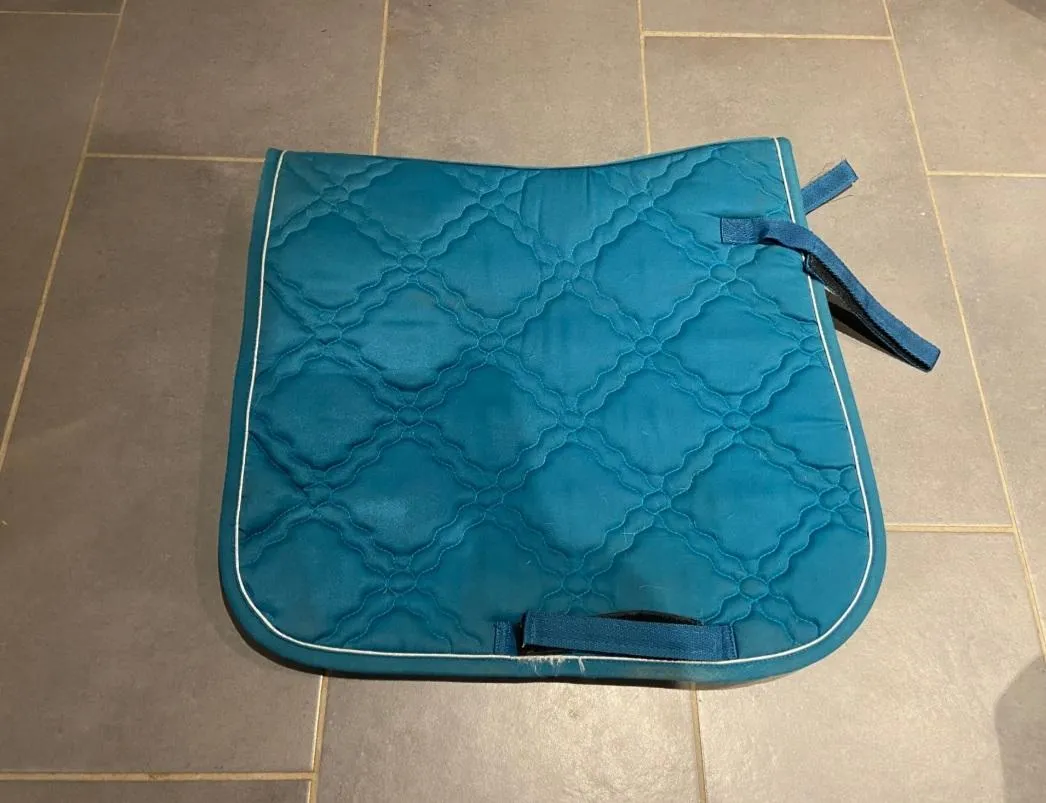 Tapis de selle turquoise hkm